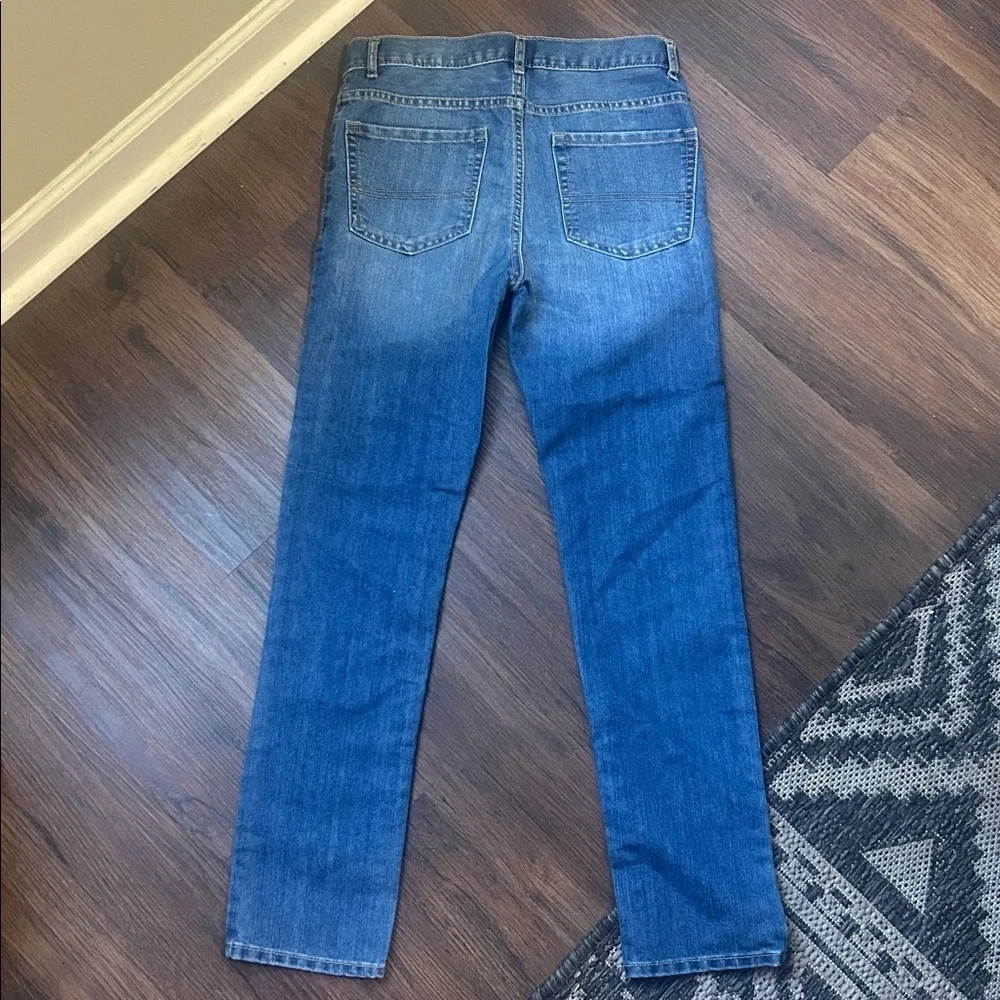 The Children's Place skinny medium wash blue jeans size 12 NWOT